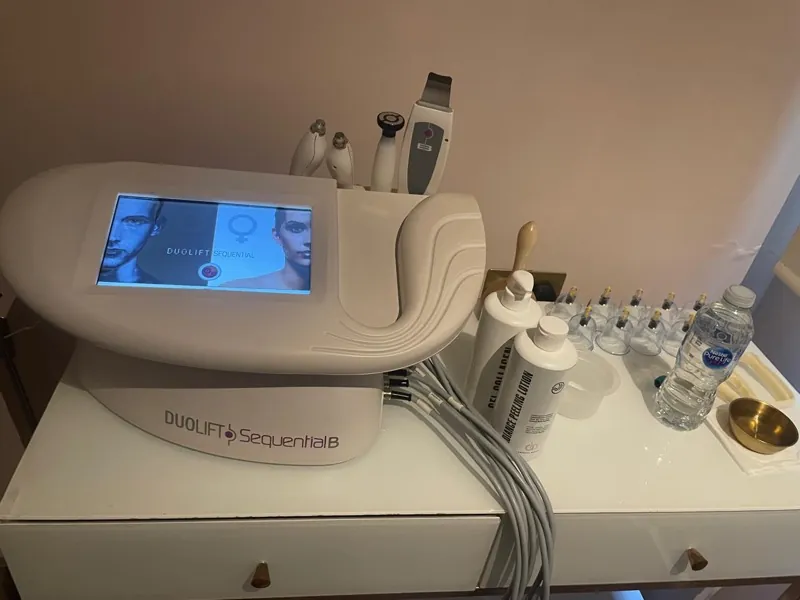 Professional multi-function skin treatment device with handpieces and cupping set